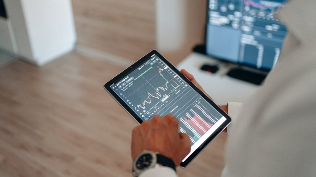 Stock market charts on screen